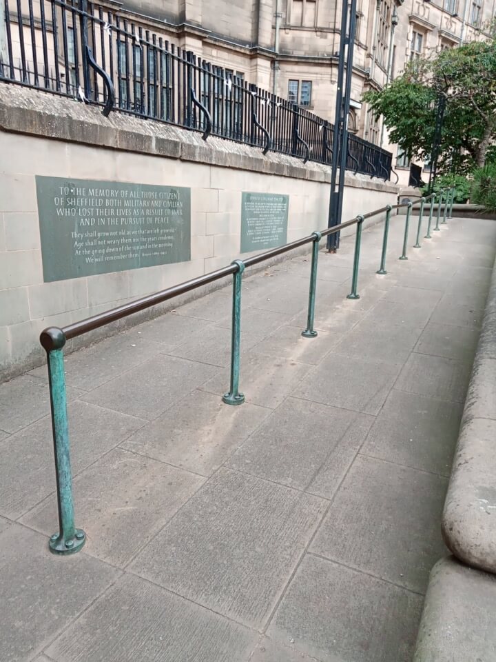 The long ramp with handrail running up from the Peace Gardens